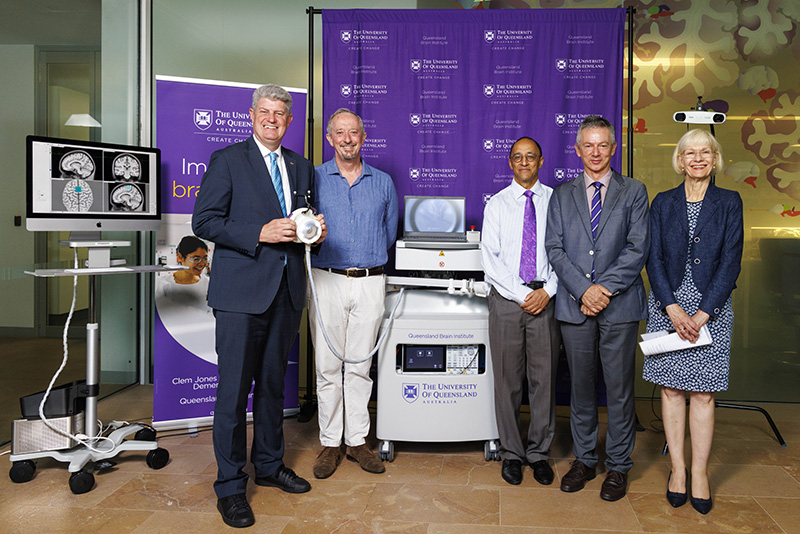 Stirling Hinchliffe Minister for Tourism, Innovation and Sport Minister Assisting the Premier on Olympics and Paralympics Sport and Engagement, Professor Peter Nestor, Professor Pankaj Sah, Professor Jurgen Götz and Vice Chancellor Deborah Terry with the ultrasound scanning device at the Queensland Brain Institute