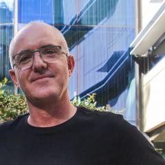Dr Tristan Wallis outside the Queensland Brain Institute